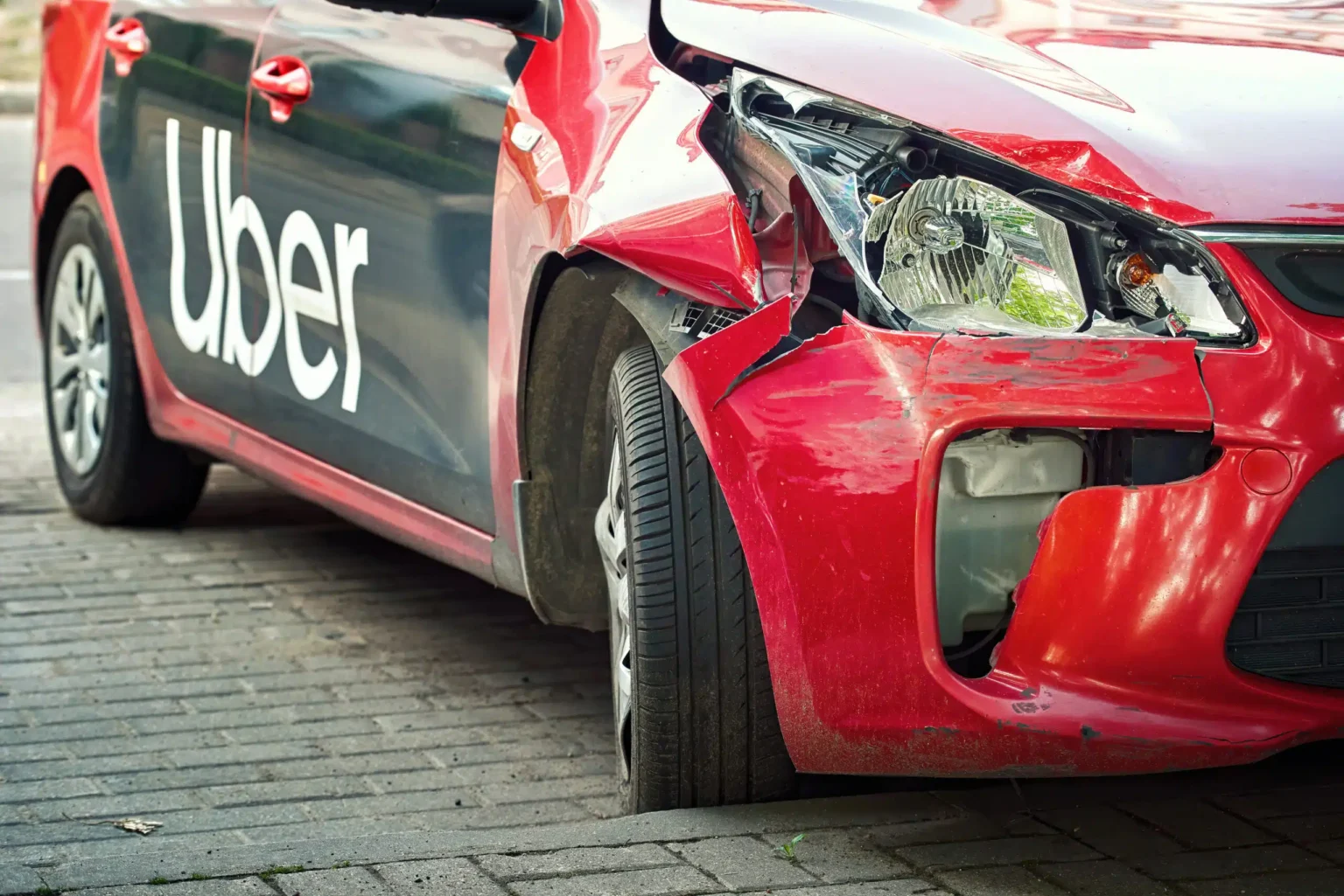 uber car with damage after an accident