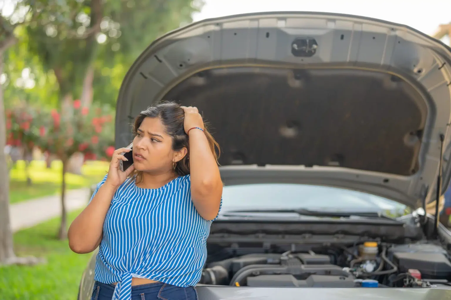 Woman,Calling,Insurance,Because,Her,Car,Stopped,Working,In,The