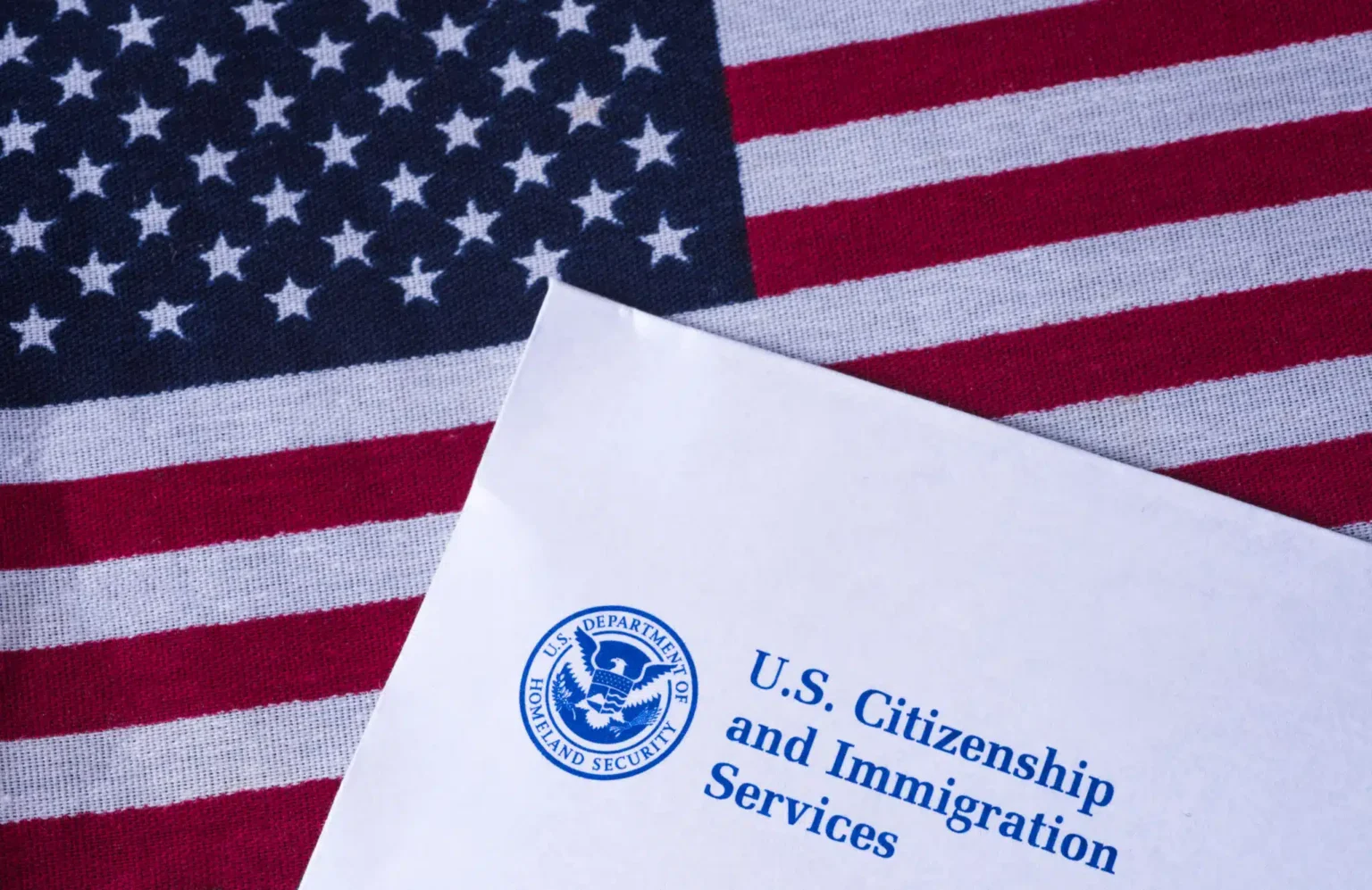 Letter,From,Us,Citizenship,And,Immigration,Services,On,Flag,Of